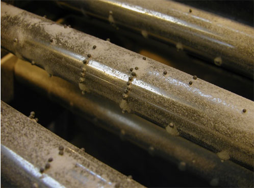 Figure 2: Paramagnetic attraction of Hastelloy C22 shards on a 9000 Gauss magnetic rod.