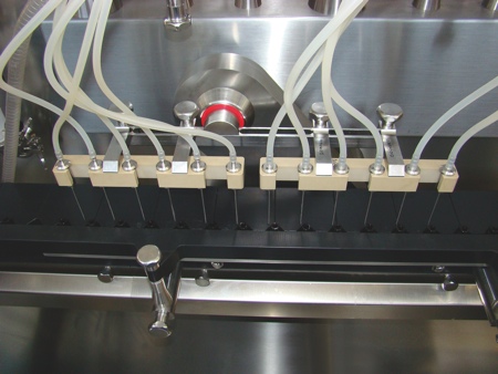 Continuous high speed filling of sterile liquids