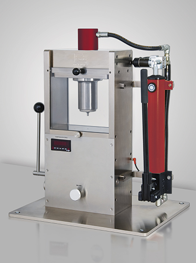 A single-station tablet press for conducting compression studies