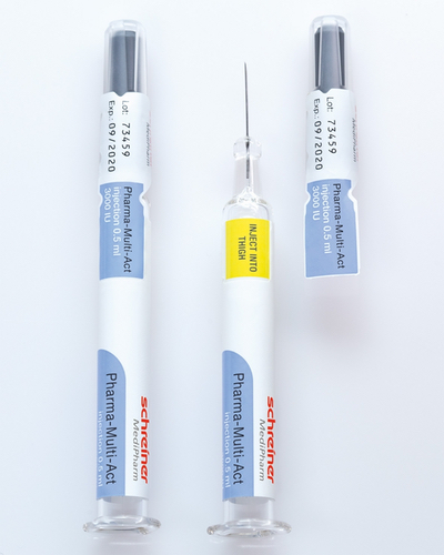 Easy open syringe label and cap with detachable labels