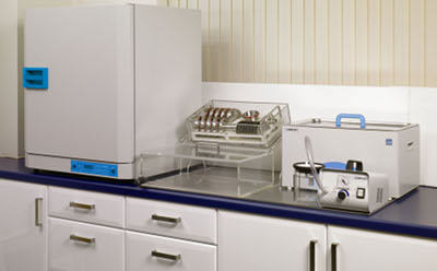 Integrated cleaning system with a small footprint